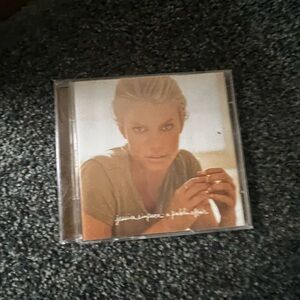 Jessica Simpson Album with Beige and White Cover